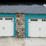 Two,Cars,Garage,Door,Painted,In,White,And,Green,Color